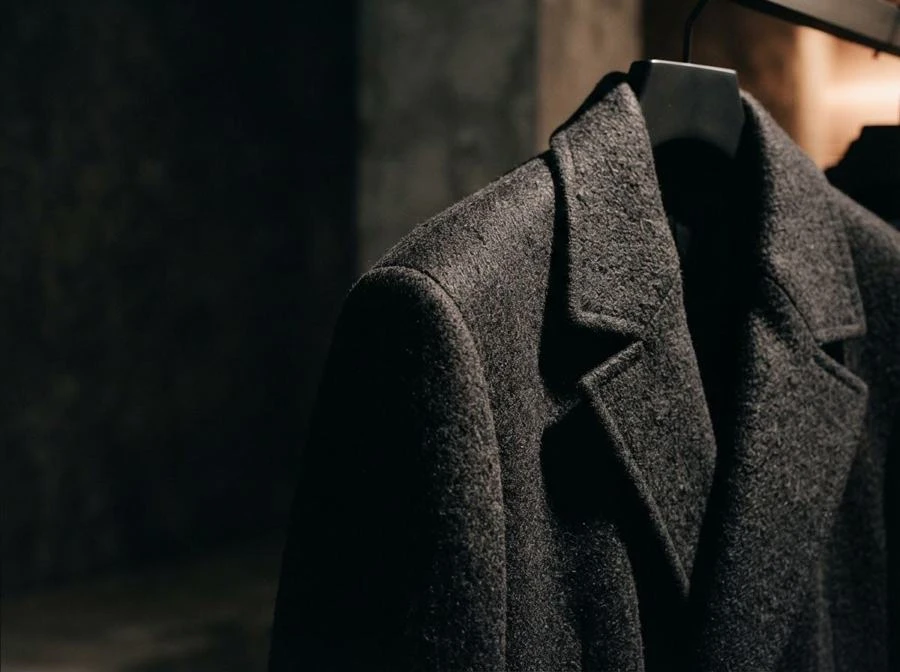 Dark structured Daiviq textile with considered tailoring
